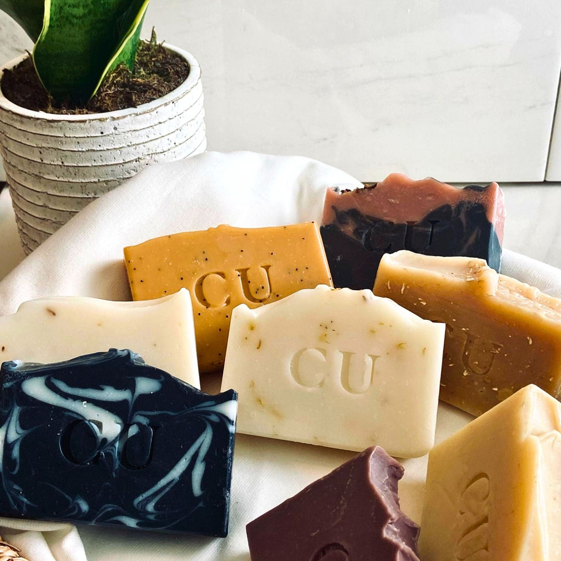A display of all natural handcrafted soap. Cherish U®