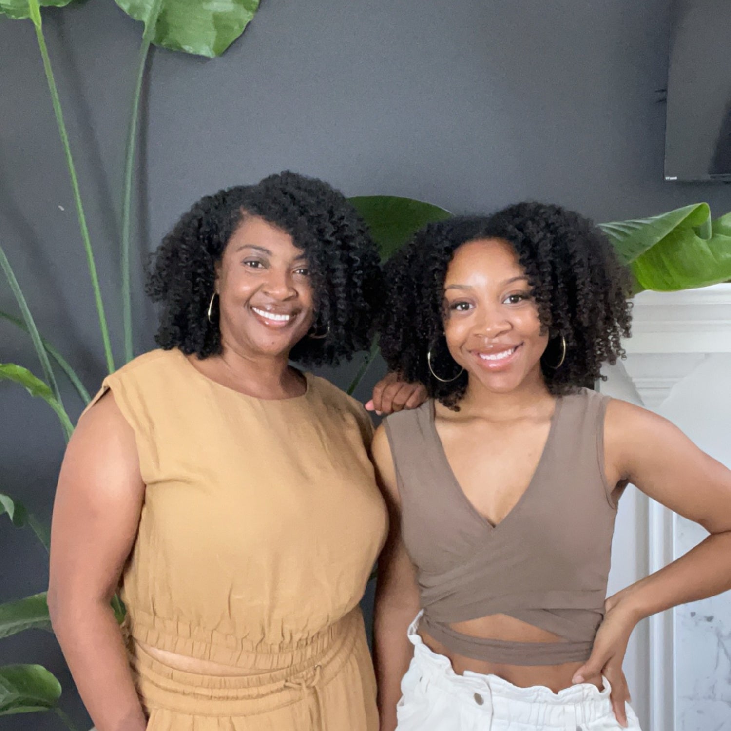 Katrice and Jaimi, the dynamic mother-daughter duo behind Cherish U, standing side by side and smiling warmly