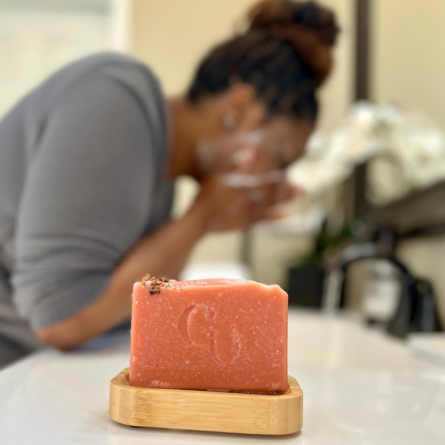 Face washing with rose clay soap, experiencing its gentle cleansing and soothing effects with a delicate floral  citrusy fragrance Cherish U®