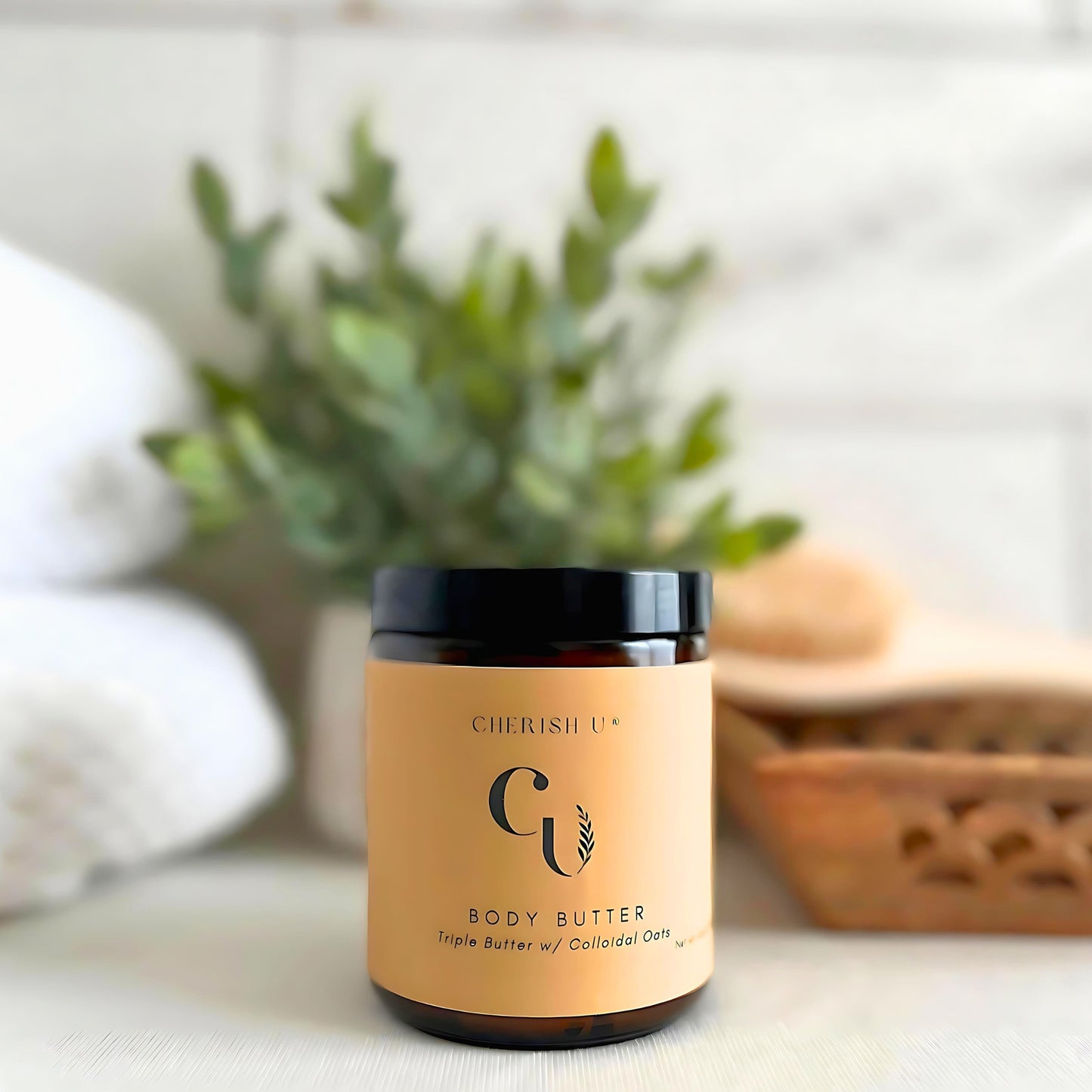 Amber jar of Triple Butter Body Butter with Colloidal Oats, designed to nourish and soothe dry skin with shea, mango, cocoa butter, and oats Cherish U®