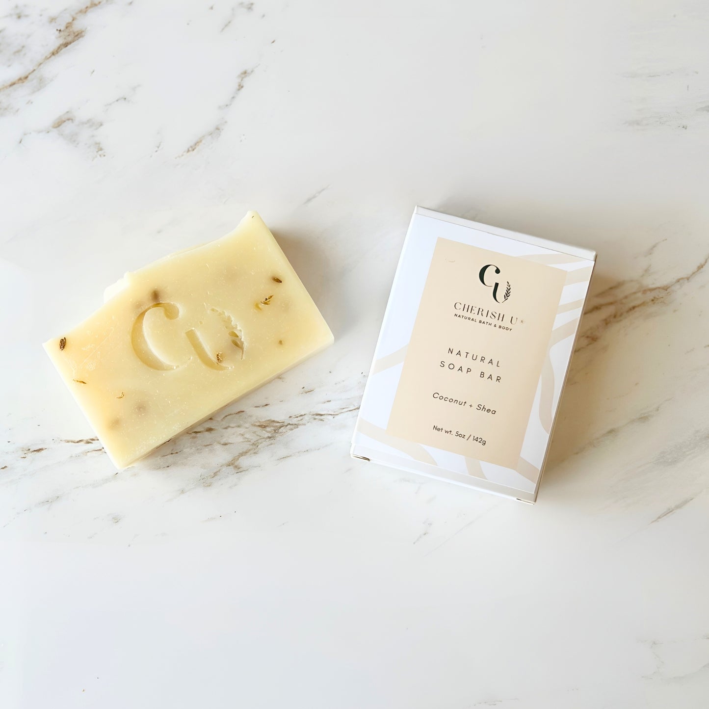 All-natural Coconut Shea Soap, a hydrating blend of coconut oil and shea butter, designed to moisturize and nourish dry skin. Cherish U®