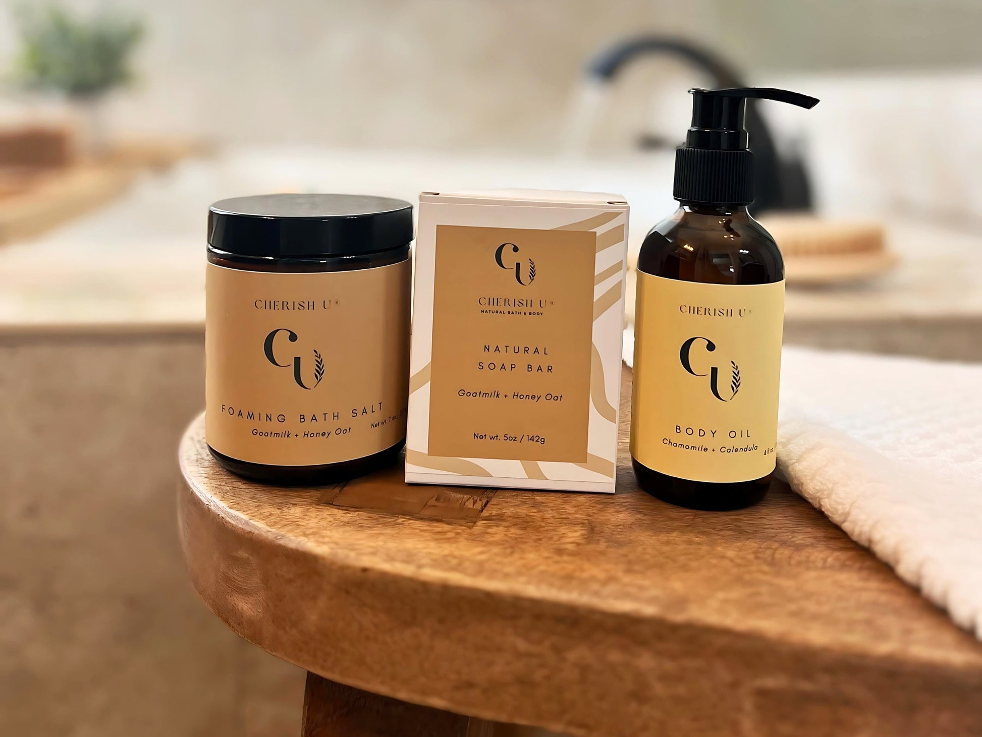 Nourish Spa Bath Gift Set with Goat Milk + Honey Oat Soap, Foaming Bath Salt, and Chamomile + Calendula Body Oil for a nourishing and relaxing bath experience.