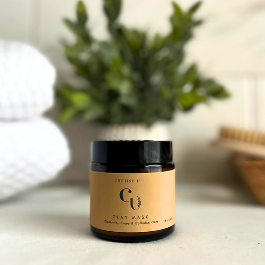 Amber jar of Goat Milk + Honey Oat Mask, designed to nourish and soothe sensitive skin with goat milk, honey, and oats. Cherish U®